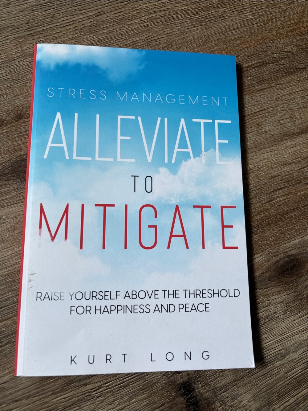 White & Blue 'Alleviate to Mitigate' Paperback Stress Management Book